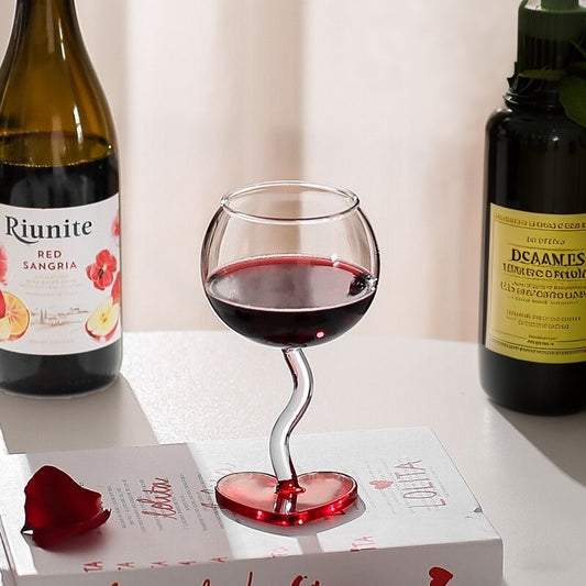 Heart design stem glass with wine bottle and romantic dining decoration