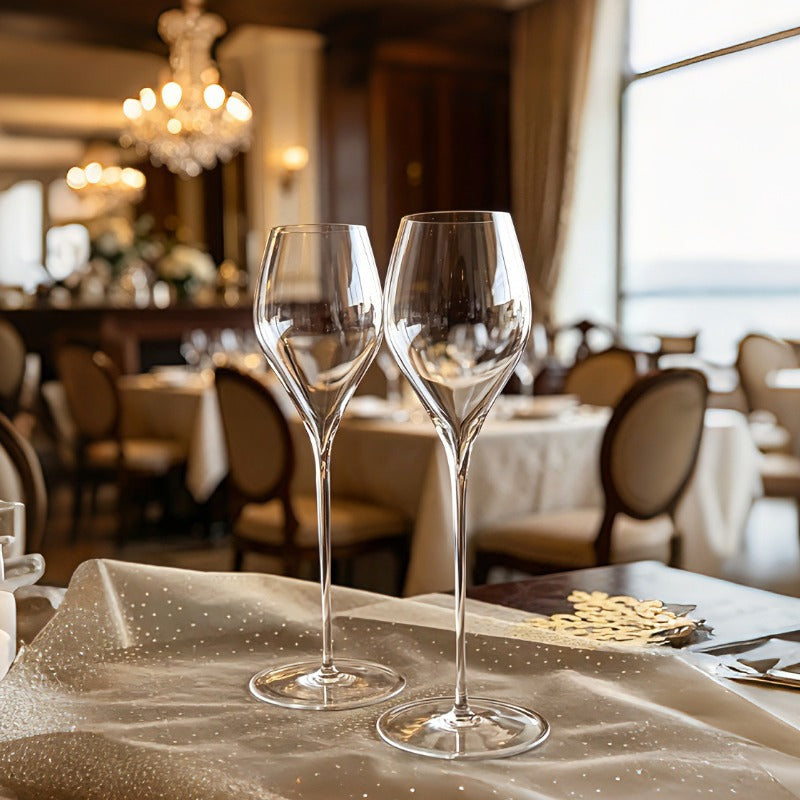 Elegant stemmed glasses arranged on a restaurant dining table